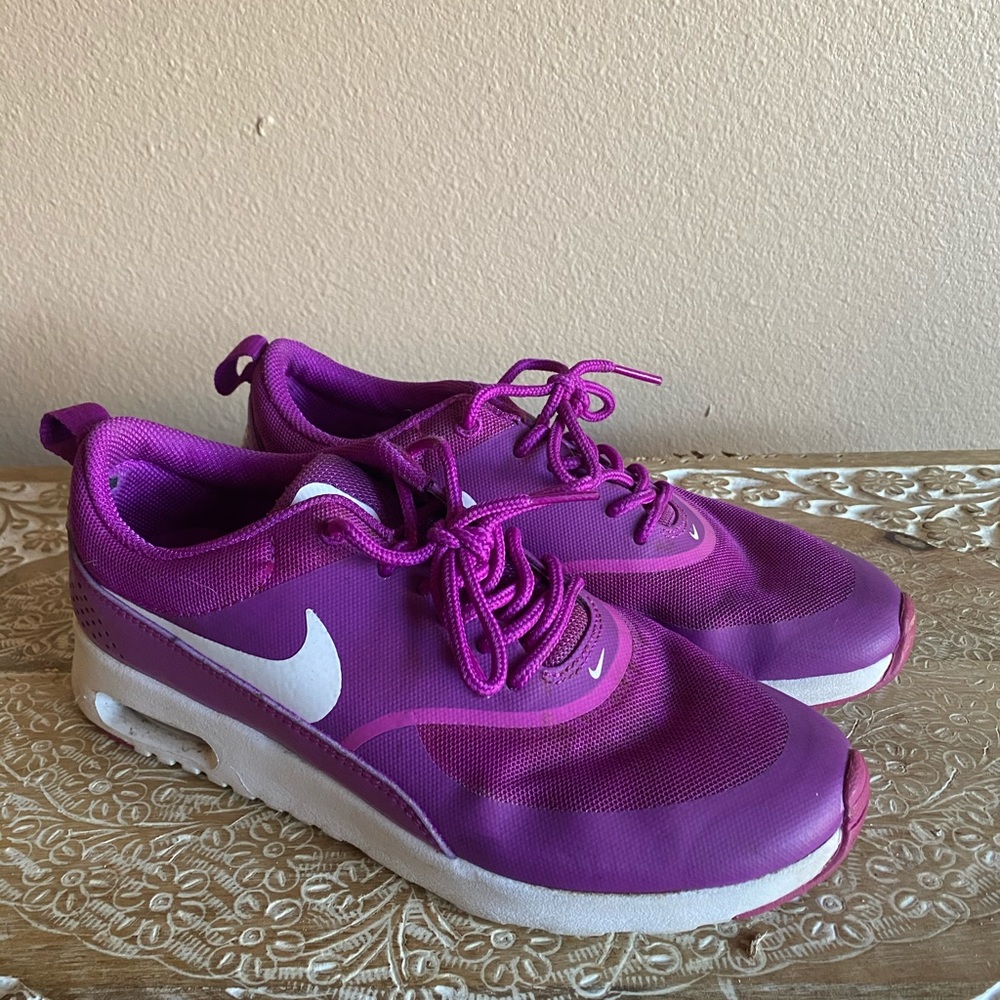 Purple nike shoes